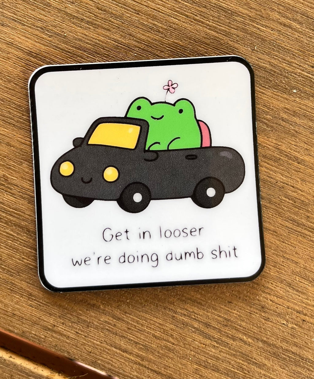 Get in looser die cut sticker